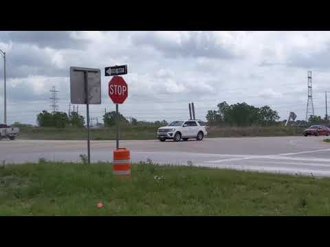 tesla GigaTexas so busy they need a police officer to direct traffic now