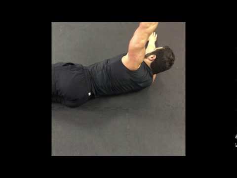 floor rear delt dumbbell raises