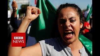 Migrant caravan: Angry protests in Mexico's Tijuana - BBC News