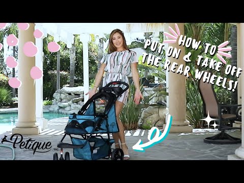 Part of a video titled How to Take Off & Put On the Rear Wheels - Petique Durable Pet Stroller