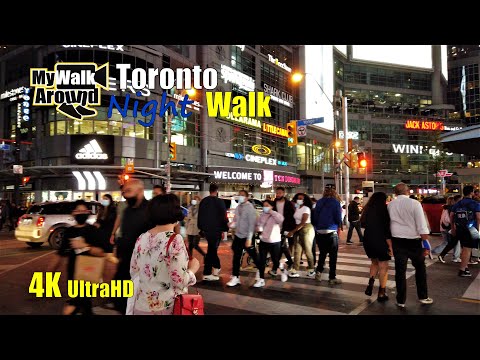Narrated walk - Toronto night walk at Yonge Dundas square seeing people and lights (4k video)