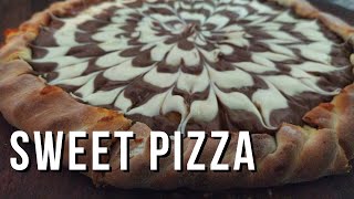 Making a delicious milk chocolate sweet pizza