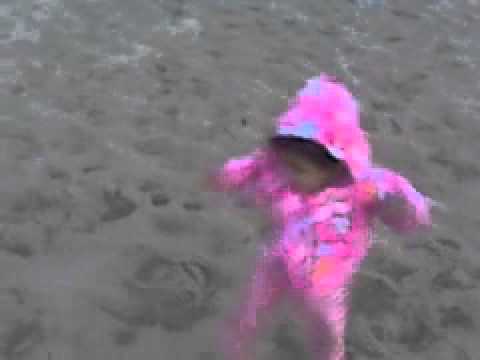 Nayla playing on the beach
