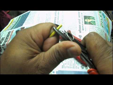 Wire stripping and cutting tool