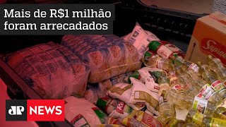 Campanha da Jovem Pan com Brasil 200 distribui cestas básicas em Capão Redondo