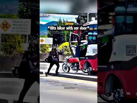 Road Raging Biker Hits Drivers Car With Helmet