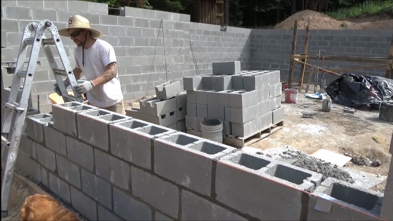 Cinderblock foundation for the offgrid cabin. Episode 13