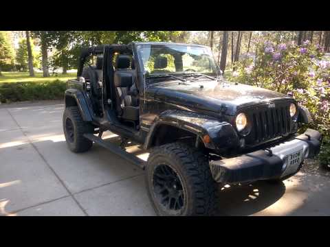 Jeep JK with remote control of AMP Research Powerstep