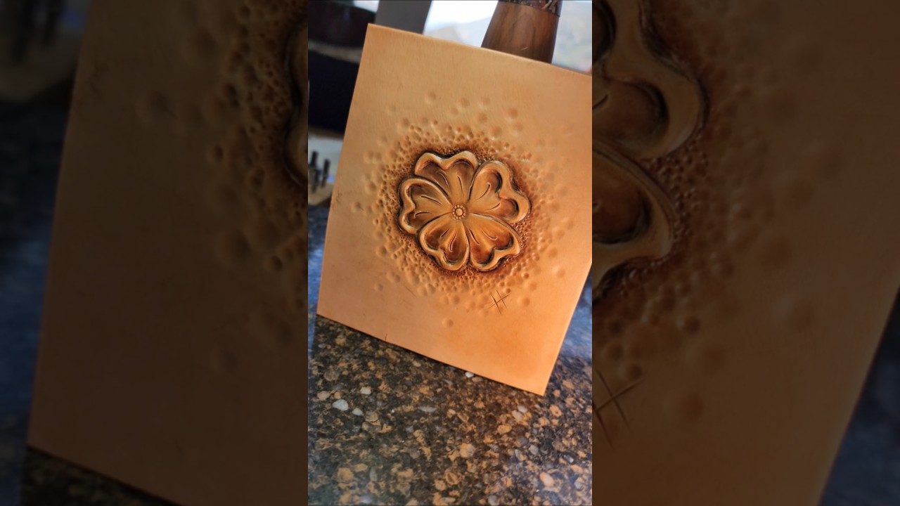 Tooling a flower on leather. #leathercraft #sculpture #art
