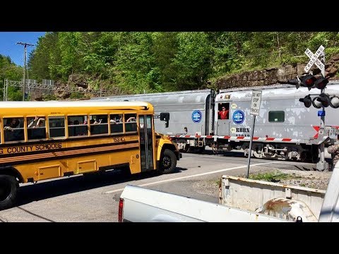 School Bus Waits For Circus Train, Kids Yell Out Windows With Excitement!