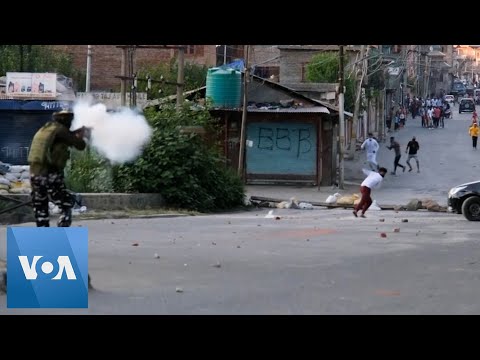 Police Clash With Protesters Amid Kashmir Lockdown