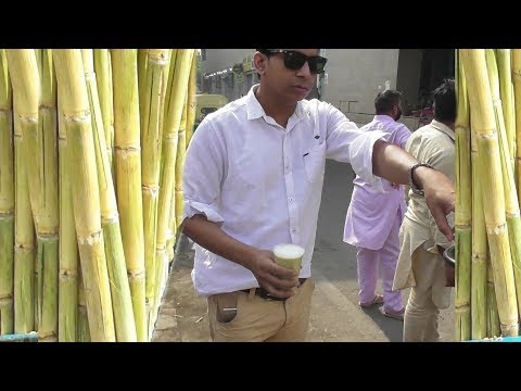 People Enjoying Sugarcane Juice in Delhi | Summer Favorite Drink for All | Street Food Loves You Video