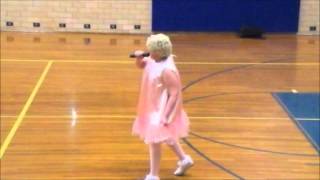 boy singing shirley temple at the talent show