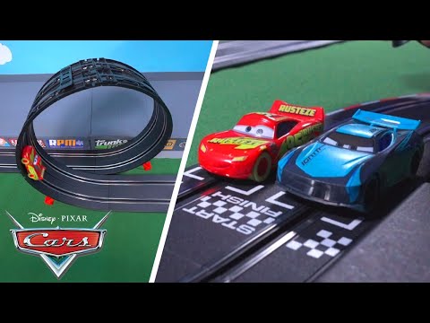 Lightning McQueen Challenges Jackson Storm on a Gravity Defying Loop! | Pixar Cars | @disneyjr