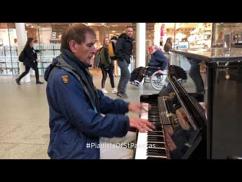 Alan gives an energetic performance on St. Pancras' piano