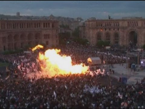 Cigarette sparks huge balloon fireball at Armenian political rally