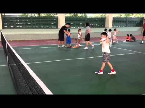 Nicholas Ng  at tennis lesson