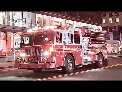 FDNY ENGINE 8 RESPONDING ON WEST 57TH STREET ON UPPER WEST SIDE AREA OF MANHATTAN IN NEW YORK CITY.