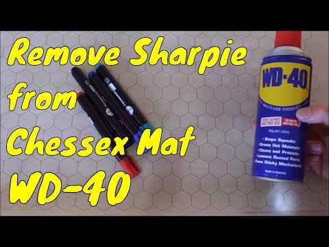 Part of a video titled Does WD40 Remove Permanent Pen, Chessex Vinyl Mat. - YouTube