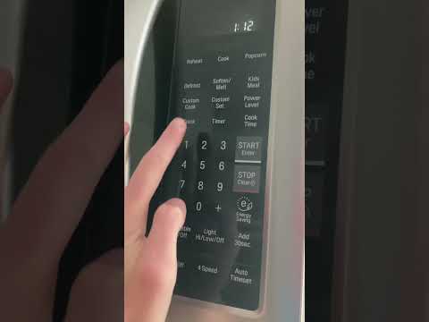 Setting the clock on an LG microwave