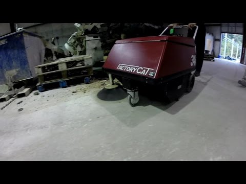 Floor Sweeper in Stone Cutting Warehouse