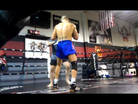 Coach Kirian and Kevin doing some padwork