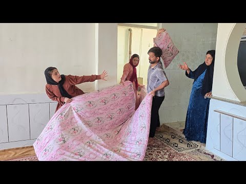 The first wife wants to arrange a room for her husband, but the second wife prevents it.