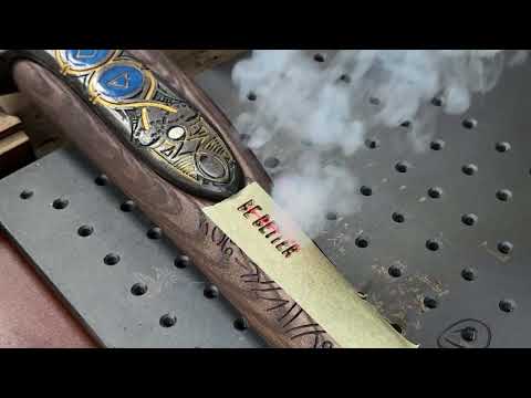 kratos-gold-4 - Engraving the Leviathan Axe - Hand-forged Leviathan axe with leather wrap