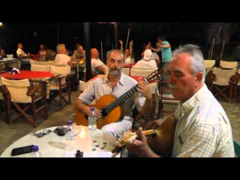 Fish meze and rembetiko music in a tavern, Samos