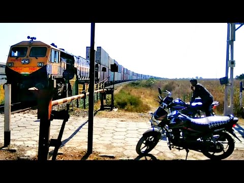 Giant double container freight train powerd by 👉 diesel locomotive WDG4 & WDG4D, clip 2
