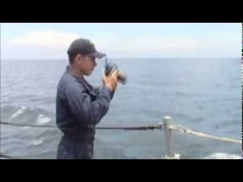 U.S. Navy continues the search for MH370 as USS Kidd (DDG 100) transits the Strait of Malacca