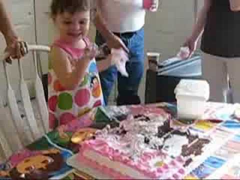 Cait smashes birthday cake