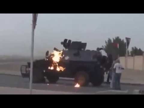 Rioters Attacking Armored Vehicles With Molotov's