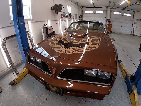 1978 Trans Am. Installing new Pypes mufflers.