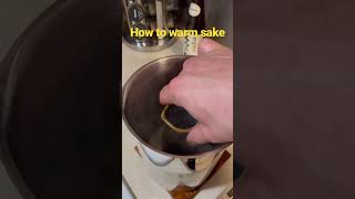 Heat water, remove, warm sake, then serve. #sake #junmai #shorts