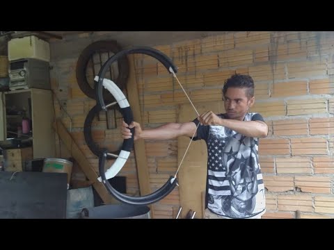 How to make a bow and arrow from a bicycle rim.