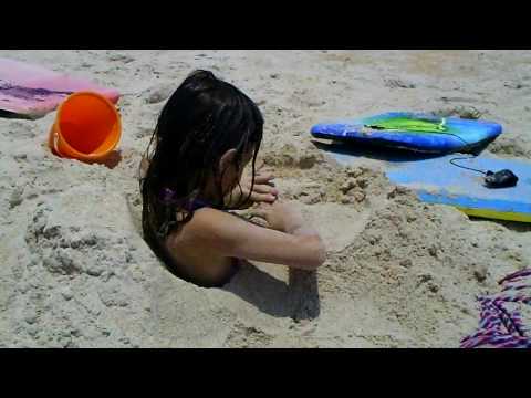 Ansley in the sand