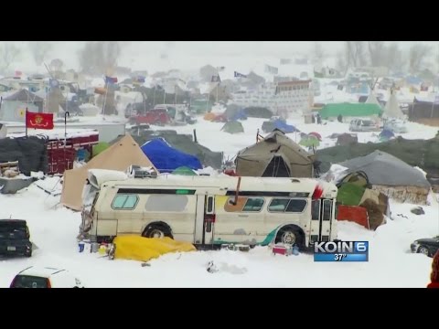 Dakota Access: Fierce weather hits, protesters stay