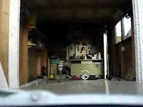 driving the 230.6 W114 in the garage cockpit view