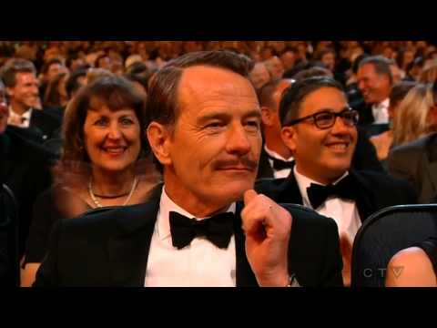 Julia Louis-Dreyfus wins an Emmy (and kisses with Bryan Cranston) 2014