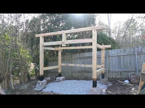 Building a timber frame woodshed that is scribed to stone