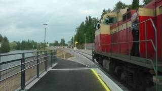 Regional train 748 departs Savonlinna station with Dv12 and blue coaches