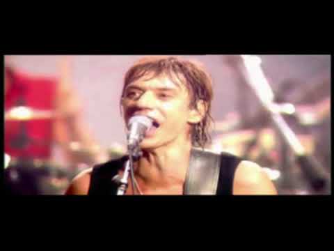 Videoclip de Argent trop cher (Live Version) — Les Enfoirés