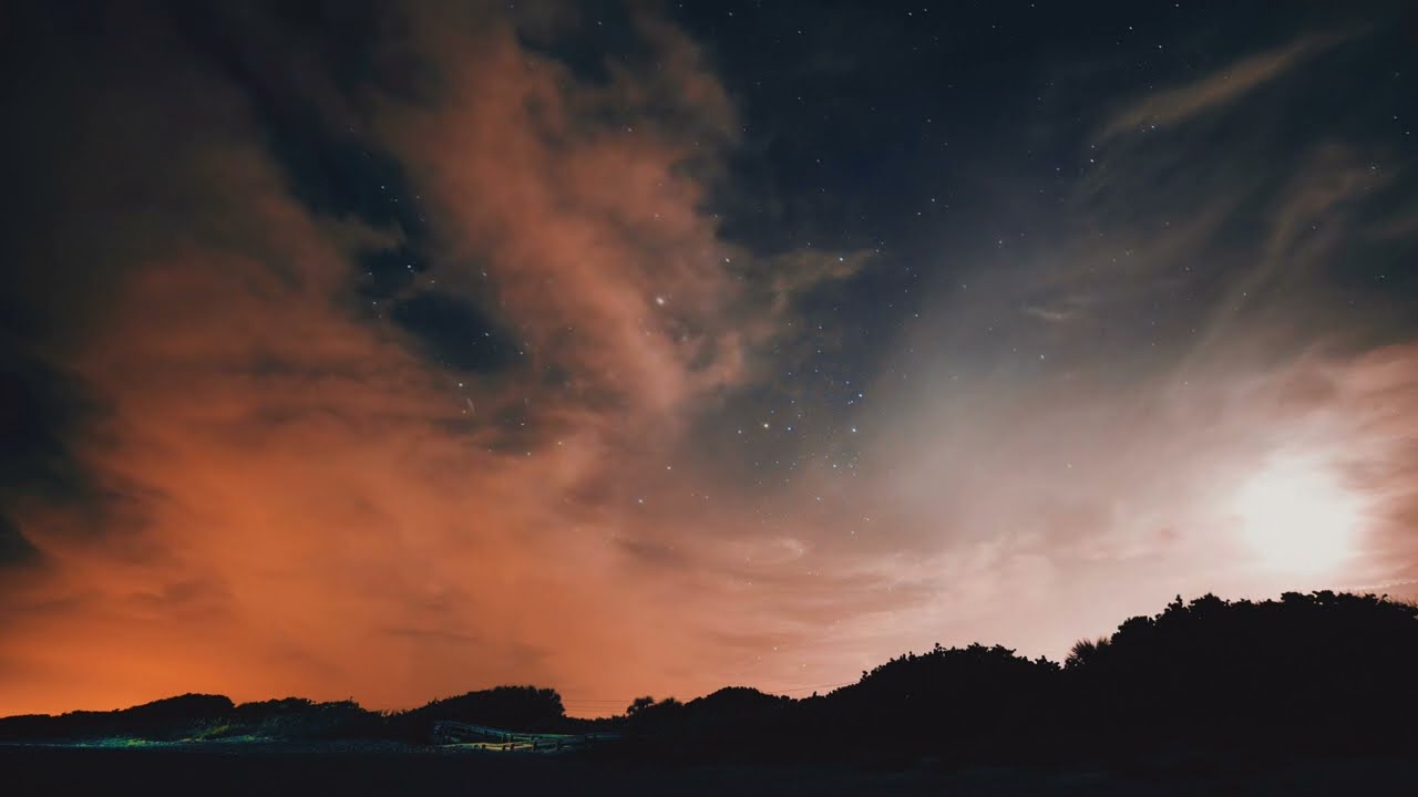 4K Aurora Borealis Milky Way Galaxy Rise Time Lapse Stars Over Mountains Simulated Northern Lights