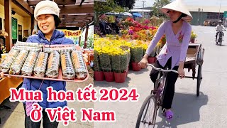 Tấp nập chợ hoa tết 2024 ở Việt Nam và ở Mỹ
