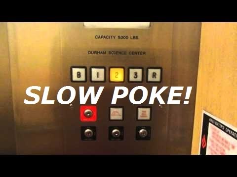 Heavily modded Dover hydraulic elevator (rear) at Durham Science building UNO