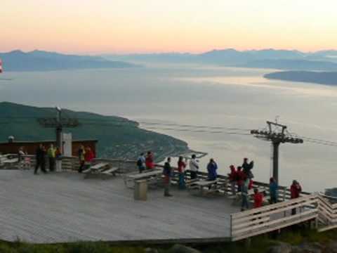 Midnight sun above Ofotfjorden in Narvik (Norway)