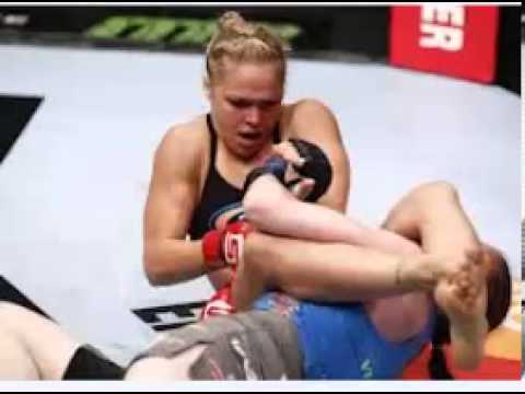 Ronda Rousey derrota Liz Carmouche na primeira luta feminina do UFC 157