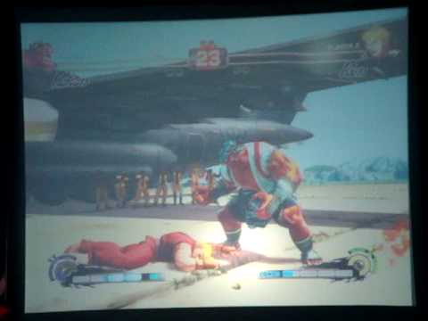 FanimeCon 2010 - Super Street Fighter IV Charity Auction - ??? (Hakan) vs. Reuben Langdon (Ken)