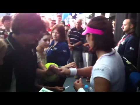 Li Na with fans after her win over Jarmila Gajdosova